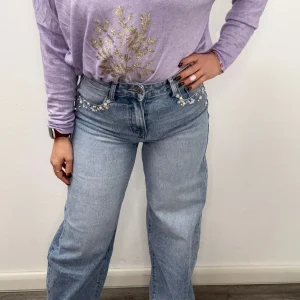 Jeans palazzo ricamo margherite - abbigliamento - Stilosa